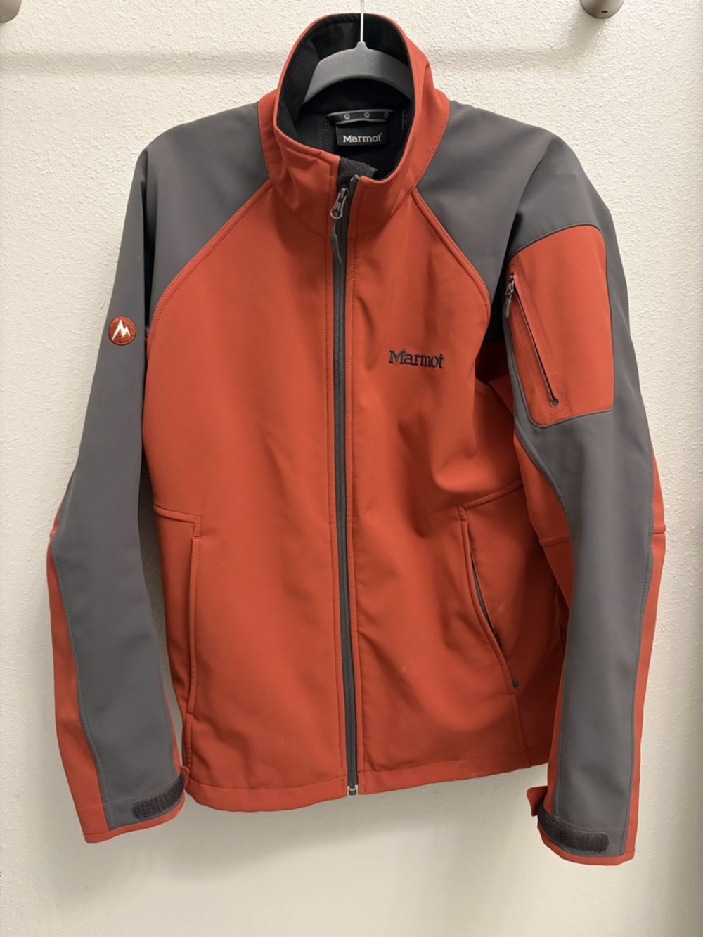 Marmot outdoor women’s jacket rusty red/orange and gray S/P fleece-lined